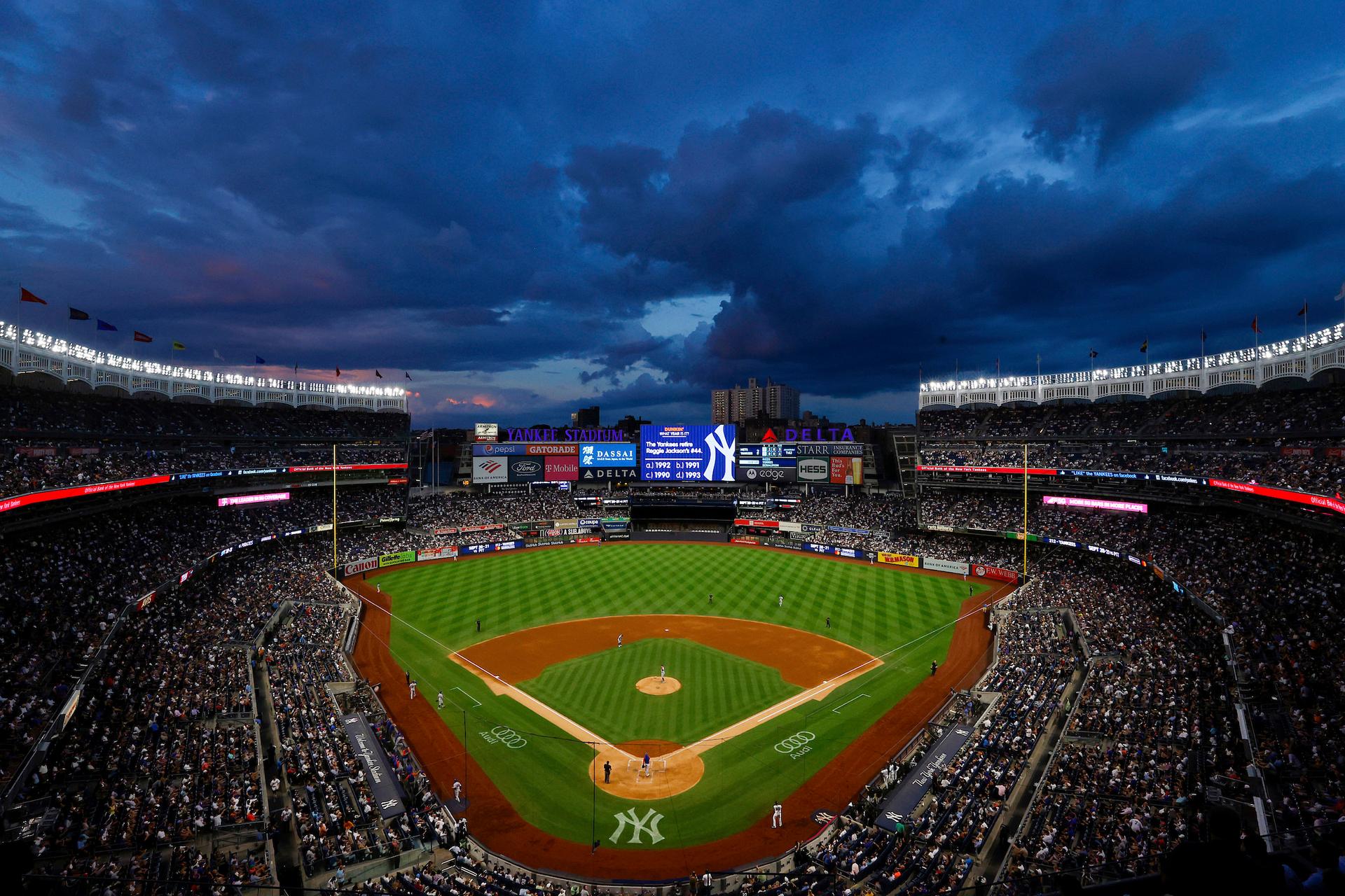 a baseball stadium filled with lots of people 