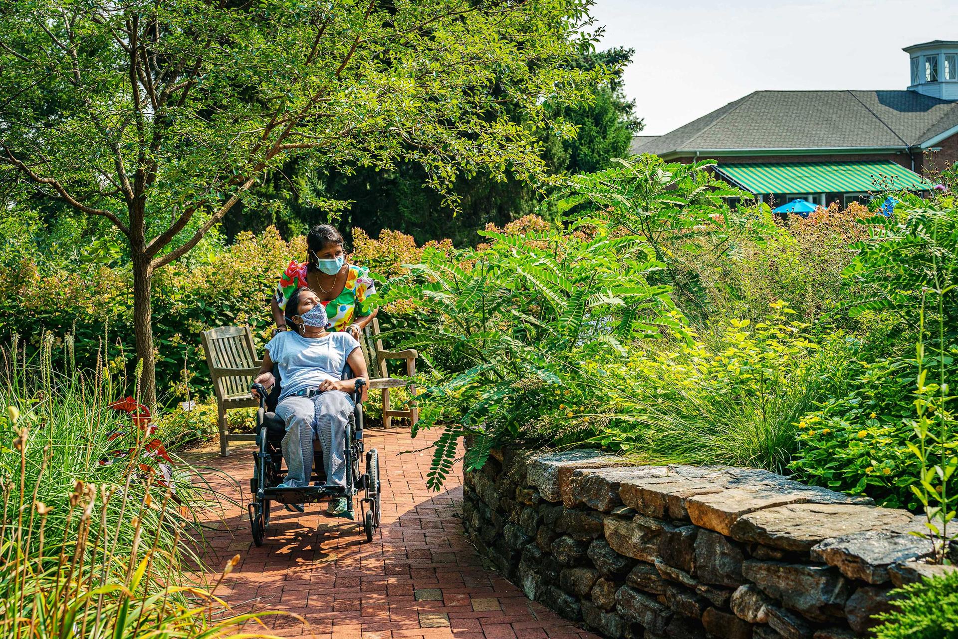 Family enjoying greenery at The New York Botanical Garden in the Bronx